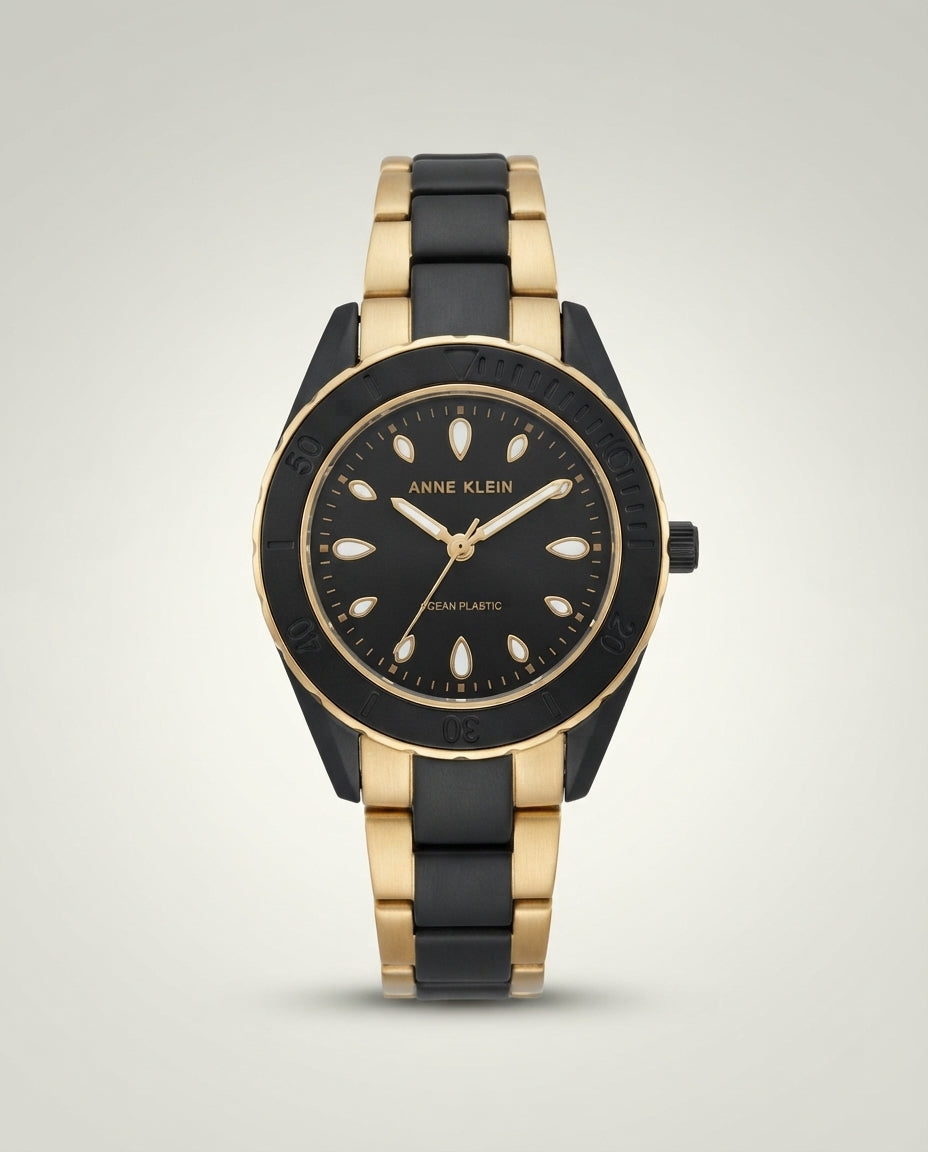 Anne Klein Women's Solar Gold-Tone and Black Oceanworks Plastic Watch